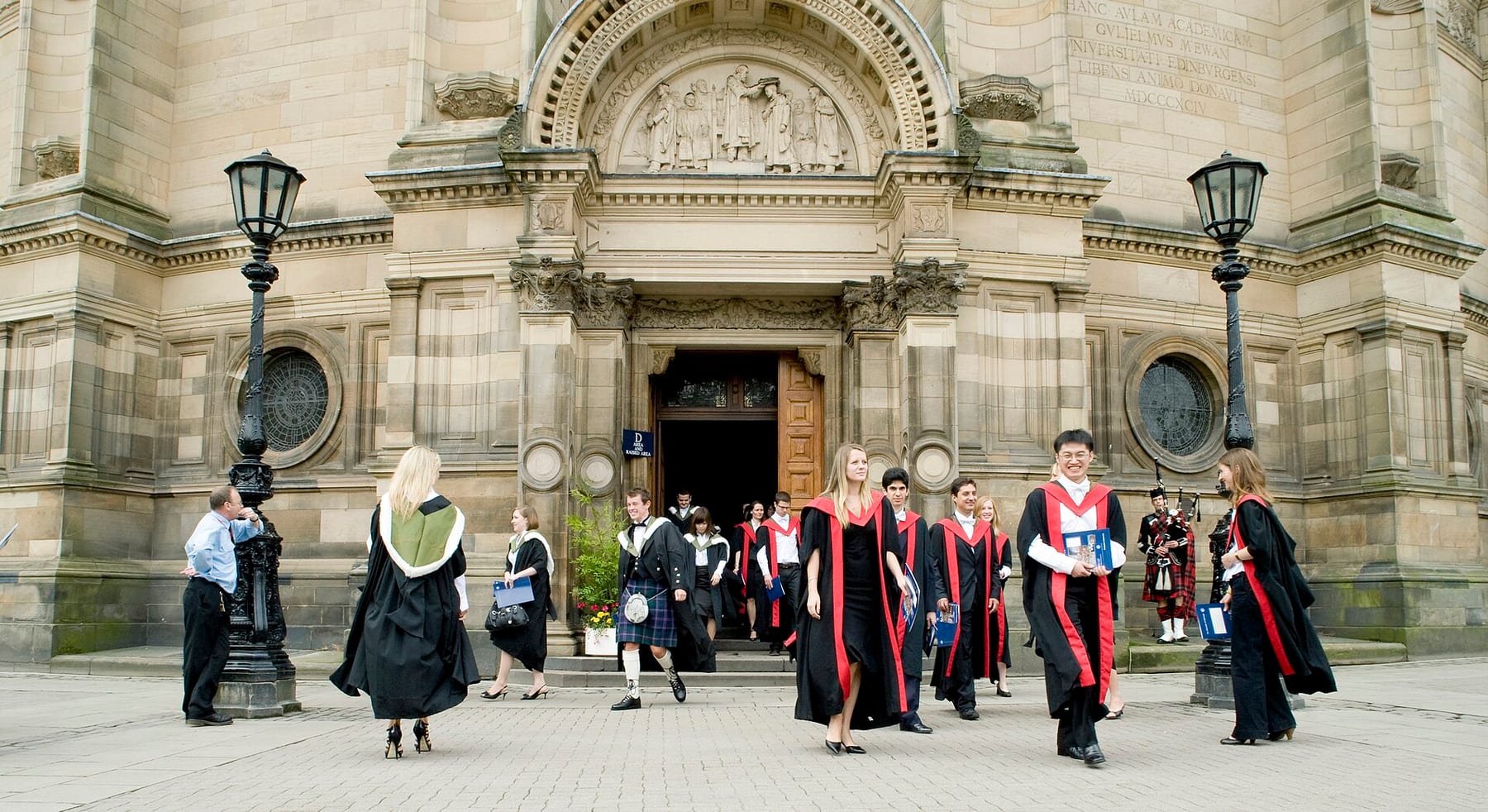 Graduates leaving a graduation ceremony