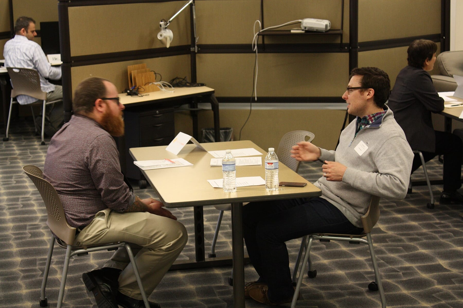 Candidates meeting employers across a table