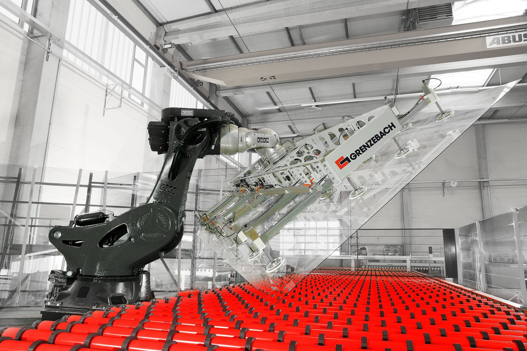 An industrial robot arm on a production line
