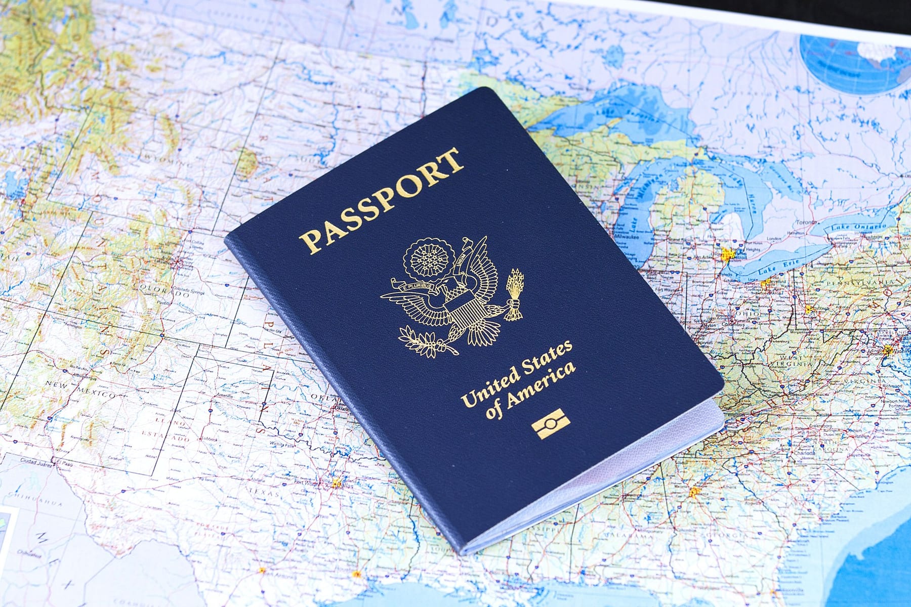 A passport resting on a map